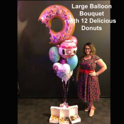 large balloon bouquet with 12 donuts